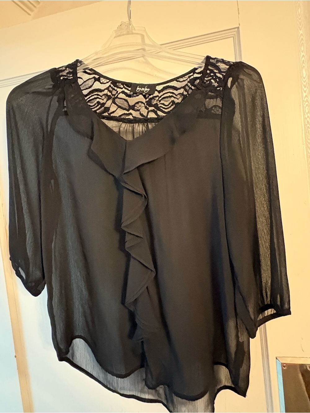 bebe Black Sheer Chiffon Blouse with Lace Yoke and Ruffle Front